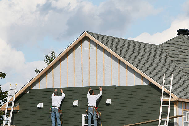 Professional Siding Replacement technician working in Central Islip, NY
